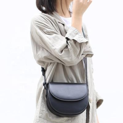 China Factory Custom Made High Quality Leather Women Shoulder Messenger Bag PU Saddle Bag Simple Texture Waterproof Most Competitive Price for sale