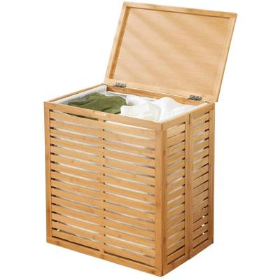 China Modern Bamboo Laundry Hamper Basket With Removable Fabric Lining And Decorative Wooden Slats for sale