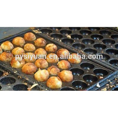 China Professional BBQ machine stainless steel cast iron oven/Commercial Non-sticky dish gas fish ball griddle/sweet and easy snack machine for sale