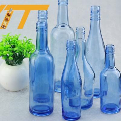 China 300ml Beverage Glass Bottle Glitter Water Boxing Blue Water Bottle for sale