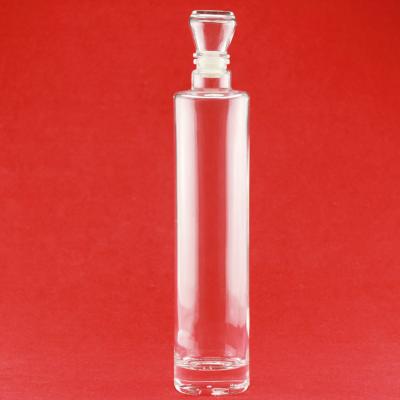 China Hot Selling Oil 700ml 750ml Round Shape Oil Glass Bottle With Glass Cap for sale