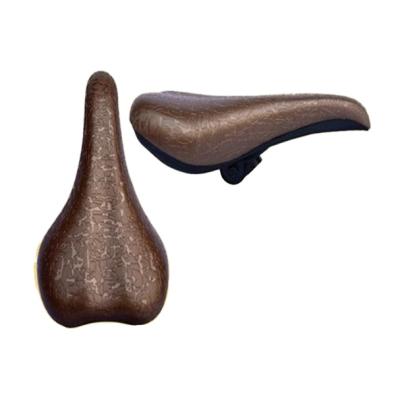 China Simple Hebei bicycle parts and accessories factory fresh and brown spring color leather bicycle saddle for sale