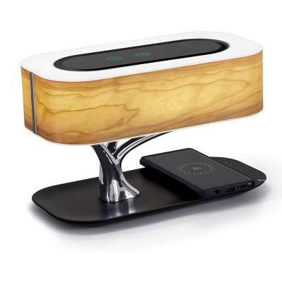 China Mobile Phone Christmas Gift Shine Bedside Wood Adjustable Wireless Charging Desk Lamp Led Portable Charger Wireless Speaker for sale