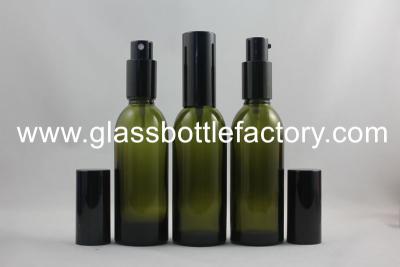 China 60ml Olive Green Essential Oil Glass Bottle With Black Pump for sale