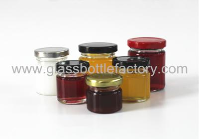 China 25ml 35ml Small Mini Empty Clear Round Glass Honey Jars With  Lids for sale