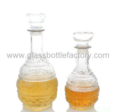 China 250ml and 500ml High Quality Clear Liquor Glass Bottle With Cap for sale