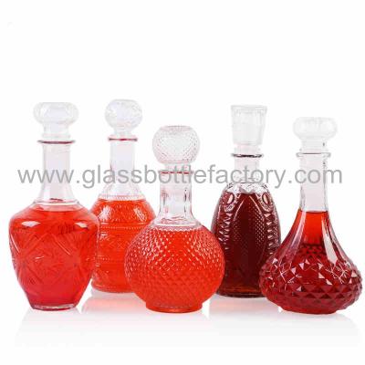 China 1000ml High Quality Clear Liquor Glass Bottle With Glass Cap for sale