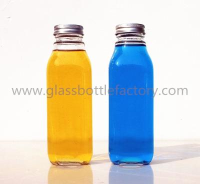 China 400ml Clear Square Glass Juice Bottles With Caps for sale