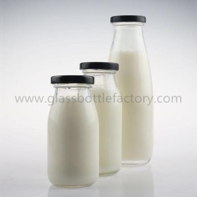 China 200ml,250ml,500ml Clear Glass Milk Bottles With Caps for sale