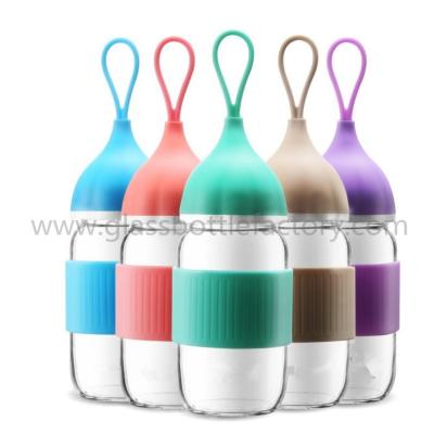 China 300ml Clear Water Glass Bottle With Blue Cap For Gift for sale