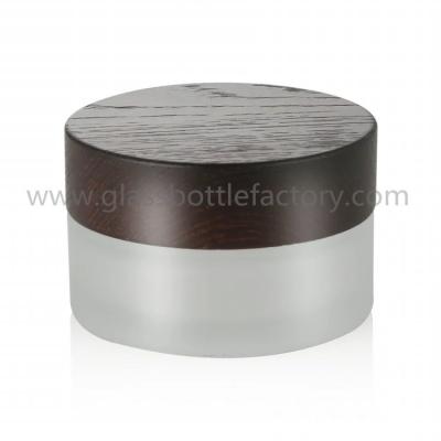 China 30g,50g High Quality Frost Round Glass Cosmetic Jars With Wood Lids for sale