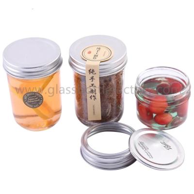 China 4oz and 8oz Empty Clear Round Glass Jam Jar With Silver Aluminum Lid for sale