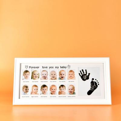 China Eco-friendly Wooden European\Modern\Middle East\Africa Wooden Frame Photo Picture Picture Frame The Simple Wooden Baby Hand And Foot Print Photo Frame for sale