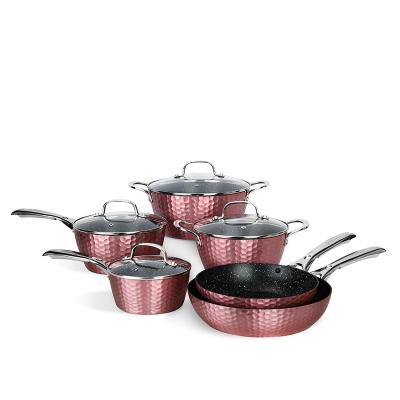 China Sustainable hot sale pink hammered non stick pan of 10 piece cookware set cookware kitchen supplies for sale