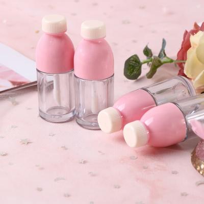 China Lip Gloss Tube 6ml Cosmetic Pink Beverage Bottle Shaped Containers Empty Mini Refillable Lip Balm Bottles Clear Lip Gloss Tube for sale