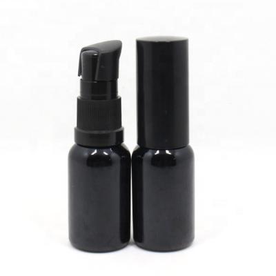 China Empty Glossy Black Cylinder 10ml 30ml 50m Cosmetic Lotion Glass Bottles Of Personal Care With Lotion Pump for sale