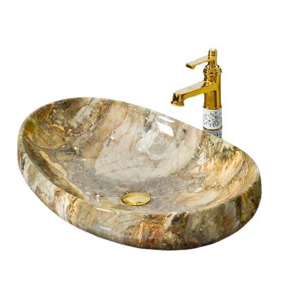 China Without Faucet European Elegant Marble Sink Above Counter Hotel Wash Basin Art Wash Basin Villa Ceramic Wash Sink for sale