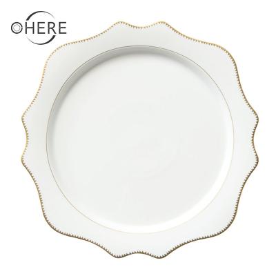 China Sustainable Luxury White Party 13 Inch Charger Dish With Gold Rim Sunflower Shape Shredded Dishes Set Porcelain Dinner Sets Luxury Wedding for sale