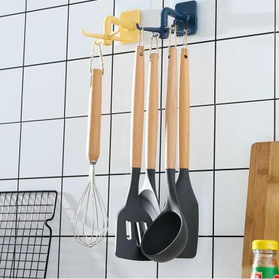 China 360 Wall Hanging Hook Bathroom Spoon Shovel Rotating Punch Rack Multifunctional Viable Punch Free Kitchen Storage Racks for sale