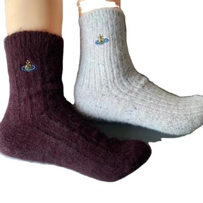 China 2021 Winter Merino Sustainable Merino Custom Socks Thickened Warm Outdoor Tube Women's Mid Size 100% Pure Wool Skiing Socks for sale