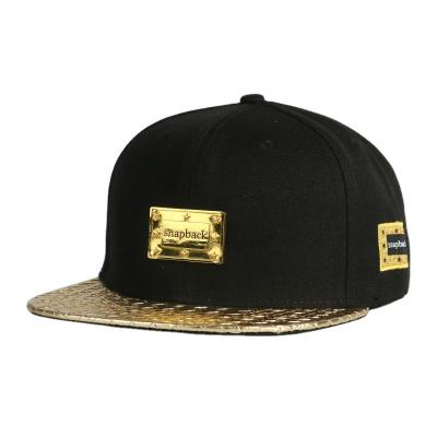 China 6 Panel Custom Wholesale COMMON Logo Gold Leather Metal Plate Snapback Cap for sale