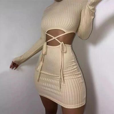 China Breathable Women Bandage Sling Dress Full Sleeve Cavity Ribbed Bodycon Elastic Waist Turtle Neck Streetwear Fashion Casual Outfits for sale