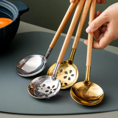 China New Arrival Sustainable Kitchen Dig Pocket Soup Skimmer Spoon Capacity Handle Stainless Steel Wooden Soup Ladle for sale