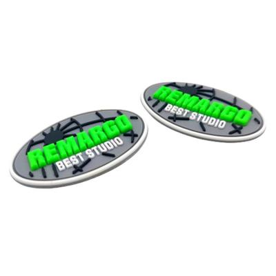 中国 Low MOQ Customized 3D Raised Colorful Logo Sewing-on Labels Soft Rubber PVC Patches for Shoes 販売のため