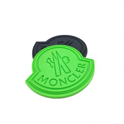 China Eco-friendly New Design Customized Embossed Logo Silicone 3D Soft Rubber Patches for Garment for sale