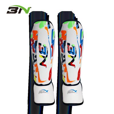 China BILLION KIDS Doodle Shin Guards For Training Boxing Muttahida Majlis-e-Amal Fighting Muay Thai Instep Leg Pads Protector for sale