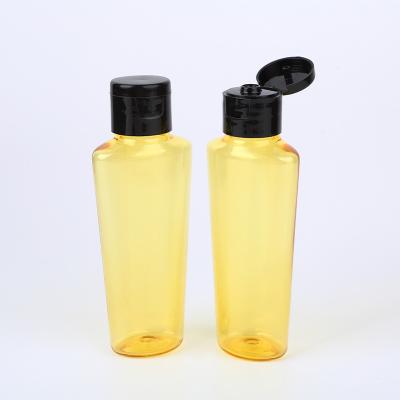 China 50ml Flip Top Cap Plastic Bottles Essential Hair Oil for Skincare Packaging for sale