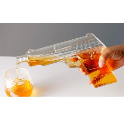 China CREATIVE Cheap Price Whiskey Wine Gun Shape Glass Crystal Decanter With Whiskey Glasses for sale