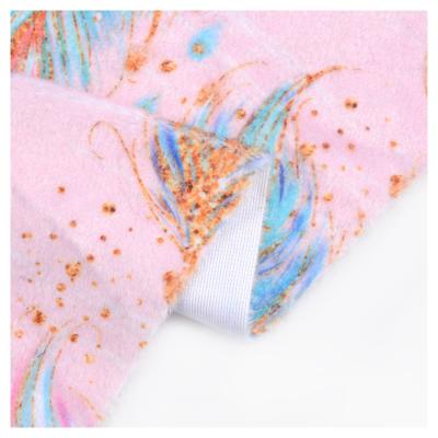 China Other wholesale beautiful pink knitted handfeel feather flannel soft polyester printed fabric for sale