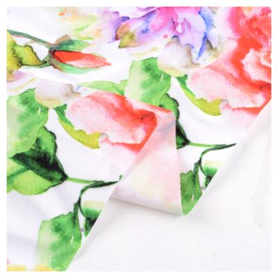 China Other Peach Skin Textile Material Large Area Printing Fancy Flowers White Polyester Fabric for sale