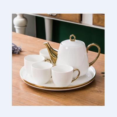 China Luxury Stocked 6pcs Tea Cup Pot Set Tea Gift Set With 4 Cup Ceramic White Teapot With Tray for sale