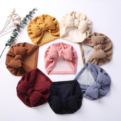 China Fashion Baby Top Tie Solid Color Round Velvet Cute Donut Gold Elastic Ball Beanie Toddler Indian Toddler Hat for sale