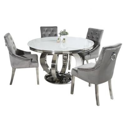 China Modern round dining table in tempered glass with 4 set gray velvet chairs for sale