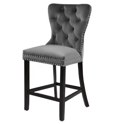 China Modern Velvet Deep Ornate Stool Against Gray for sale