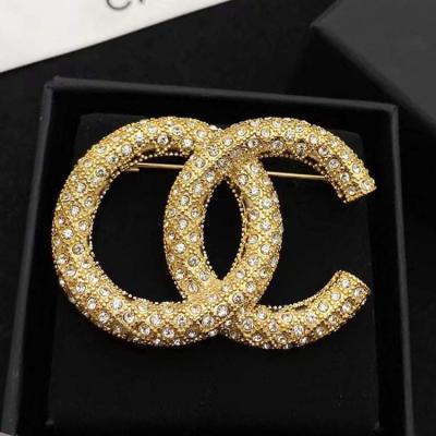 China New Designer Environmental Friendly Pearl Rhinestone Cc Brooch For Women Latest 2022 Luxury Elegant With Famous Brand Apparel Accessories for sale