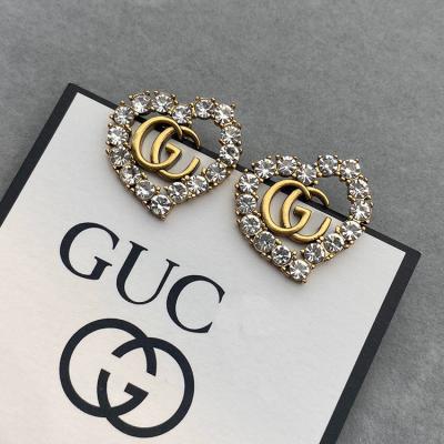 China Trendy Fashion Design Luxury Brand G Love Heart Shape Statement Geometric Crystal Stud Earrings For Women 2022 Bridal Earring for sale