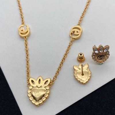 China Hot Selling Elegant Environmentally Friendly Women Wedding Heart Earrings Necklace Sets 18K Crystal Gold Plated Brand Jewelry Sets G for sale