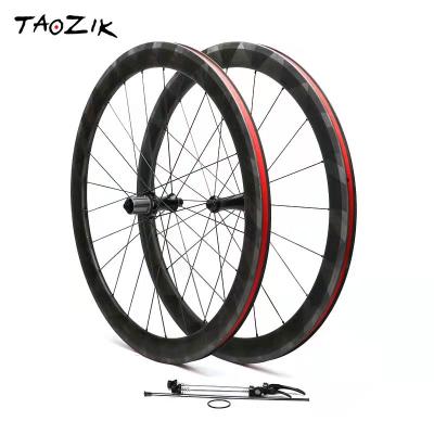 China Road Bikes TAOZIK New Arrive Full CP R18 700c 25C Carbon Fiber 50 Mm 12K Road Bike Carbon 700c Clinche Wheel Set With Carbon Fiber Spokes for sale