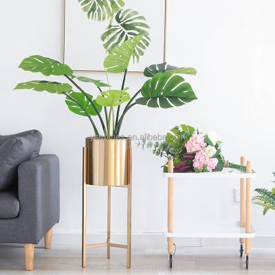 China Wholesale Modern Metal Flower Stand Wedding Decoration Light Luxury Gold Flower Pot en venta