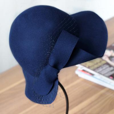 China Large Eco-Friendly Ladies Bowknot Wool Facinoator Cloche Hat for sale