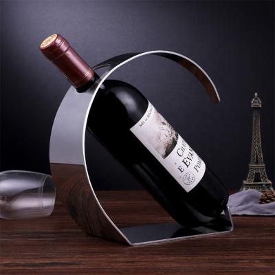 China Luxury Simple 304 Stainless Steel Wine Display Stand Bottle Wine Rack Metal Polish Viable Silver Wine Rack Mirror for Home Decoration for sale