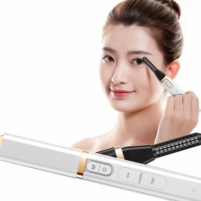 China 2021 hot sale walmart electric heated eye wicking brush electric heated eyelashes pen curler for lady make up fast effect for sale