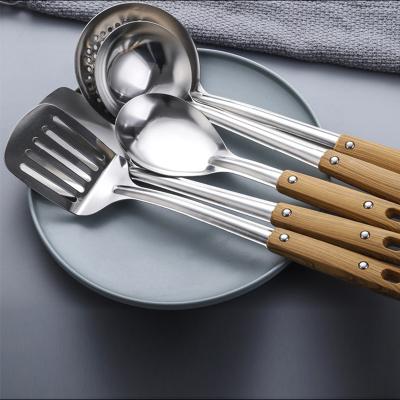 China Sustainable Wholesale 5 Pcs Non Stick Copper Stainless Steel Kitchen Utensils Set With Spoon Spatula Pockets for sale