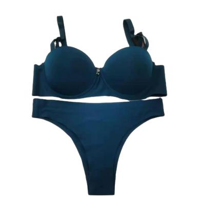 China Double-layer double-function double-function foreign trade B cup three-row button bra QUICK DRY customized rubber suit for sale