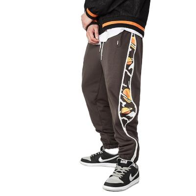 China Anti-wrinkle men's sports pants autumn and winter plus loose velvet printing embroidery plus size men's pants for sale