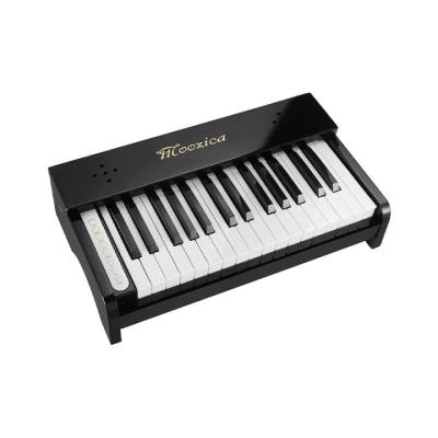 China Exquisite Black Solid Wood Portable Multifunctional Piano Keyboard Kids Musical Instrument Beginner Digital Piano For Children for sale